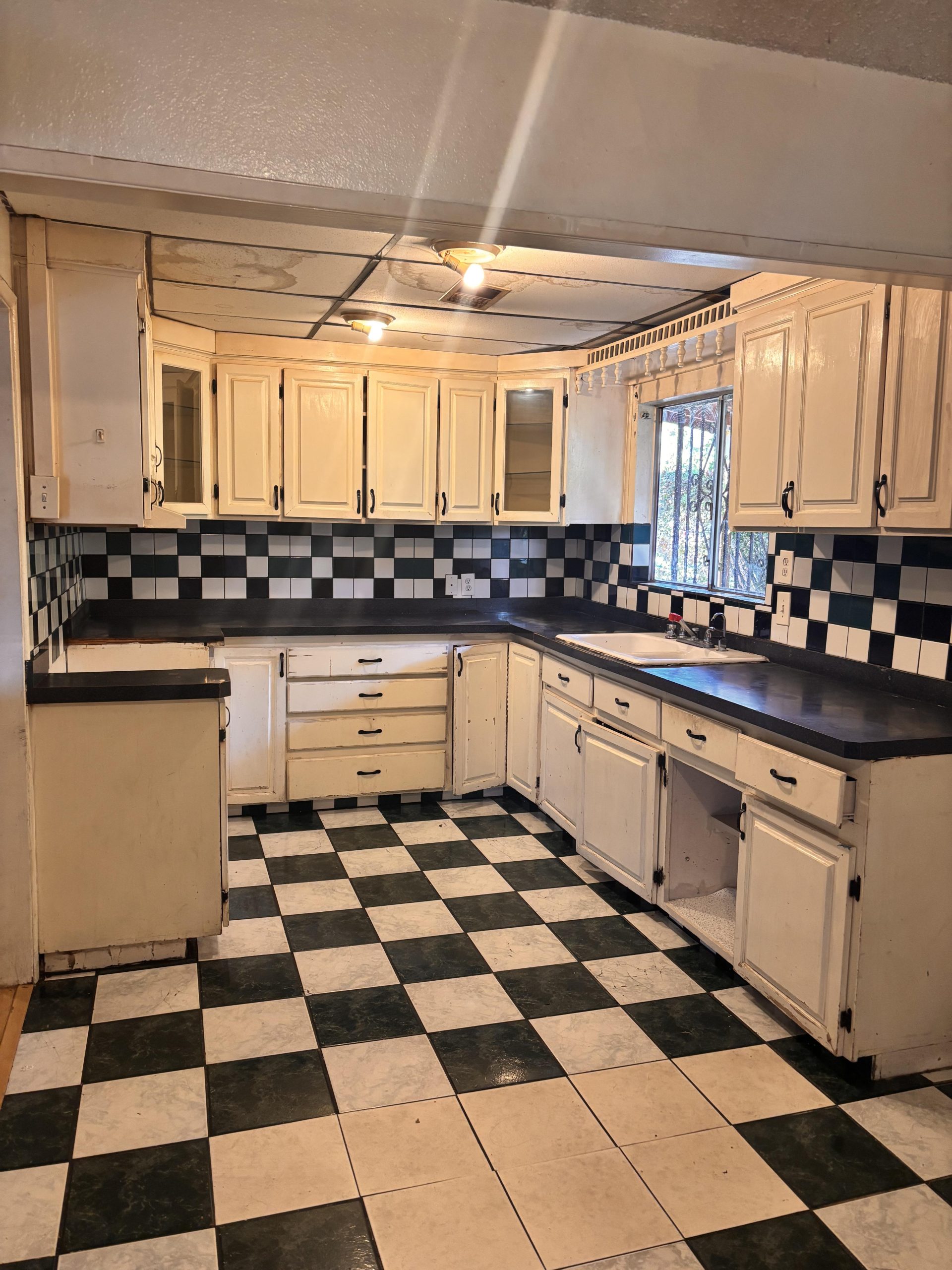 Older kitchen that may need repairs or updating before selling a home